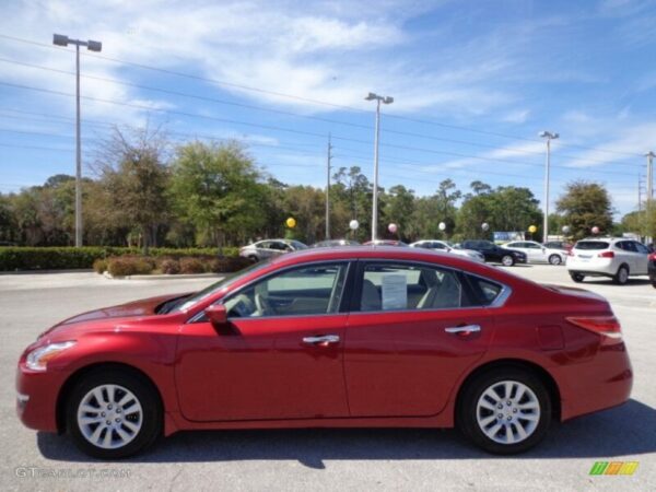 UNAVAILABLE- Red Nissan Altima
